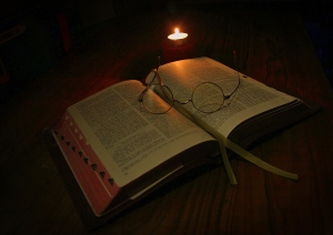 reading-book-by-candlelight